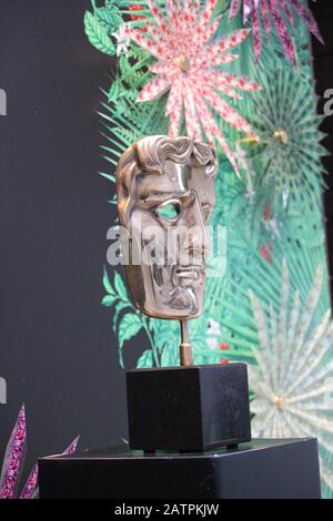 BAFTA statue, London, UK - June 19th 2018 : Bafta (British Academy film and television awards) award statue trophy on display stock, photo, photograph Stock Photo