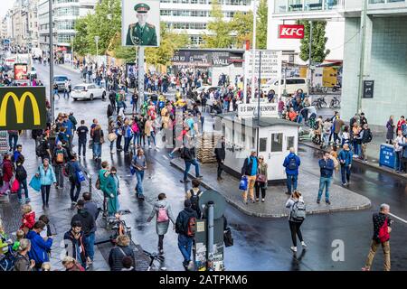 Checkpoint Charlie, former border crossing between East and West, tourists, Berlin, Germany Stock Photo