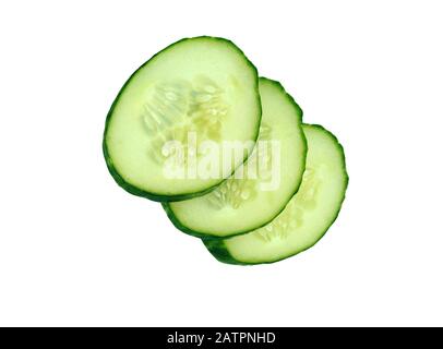 Fresh slice cucumber close-up on a white background. Stock Photo