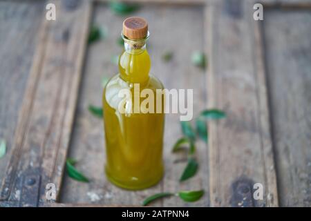 Download Glass Bottle Filled With Yellow Juice Stock Photo Alamy Yellowimages Mockups