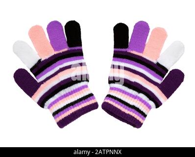 Mittens knitted. Warm woolen knitted gloves isolated on white background. Mittens with color strips. Stock Photo