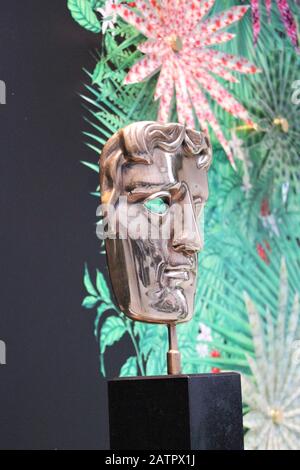 BAFTA statue, London, UK - June 19th 2018 : Bafta (British Academy film and television awards) award statue trophy on display stock, photo, photograph Stock Photo