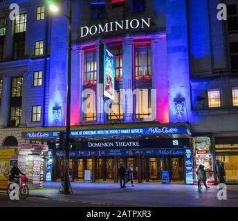 The Dominion Theatre in London's West End on Tottenham Court Road at night. Stock Photo