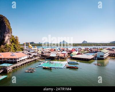 Beautiful landscape mosque sea and sky in summer at Punyi island, Ko Panyi or Koh Panyee, Muslim fisherman village landmark attractions travel by boat Stock Photo