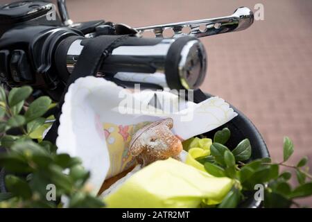 POLAND -15 April 2017:  effectuation of Easter basket and motorcycles in Holy Saturday (Easter Eve), food traditionally blessed before Easter Stock Photo