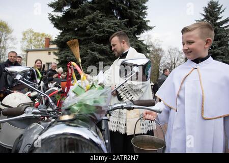 POLAND -15 April 2017:  effectuation of Easter basket and motorcycles in Holy Saturday (Easter Eve), food traditionally blessed before Easter Stock Photo