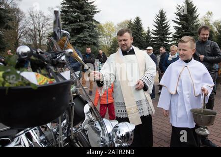 POLAND -15 April 2017:  effectuation of Easter basket and motorcycles in Holy Saturday (Easter Eve), food traditionally blessed before Easter Stock Photo