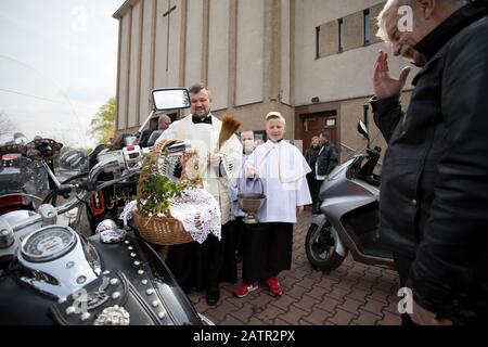 POLAND -15 April 2017:  effectuation of Easter basket and motorcycles in Holy Saturday (Easter Eve), food traditionally blessed before Easter Stock Photo