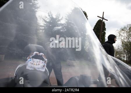 POLAND -15 April 2017:  effectuation of Easter basket and motorcycles in Holy Saturday (Easter Eve), food traditionally blessed before Easter Stock Photo