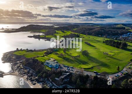 Aerial view of golf course in village of Aberdour in Fife, Scotland, UK