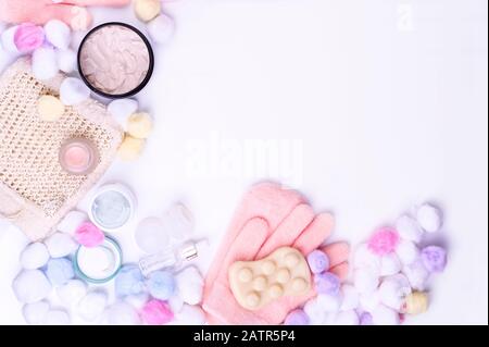 Cosmetic products and face and body care products. On a white background, top view. Copy space Stock Photo