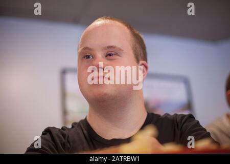 Young man with a disability Stock Photo