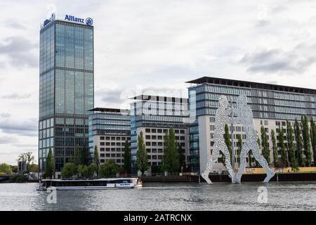 Berlin, Germany- October 6, 2019: view of the other shore from the Spree river embankment between the Oberbaunum bridge and Elsen Bridge, Molecule Man Stock Photo