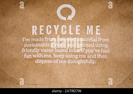Recycle me message on a brown paper bag Stock Photo