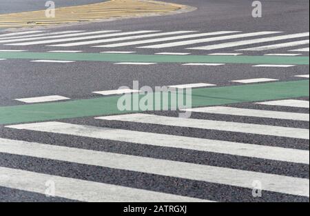 Crosswalks and other traffic lines painted on the street surface Stock Photo