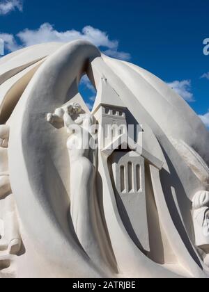 Argentina, Ushuaia. Ushuaia's Pioneers and First Settlers Monument, topped by an albatross with its wings covering the sculpture. Stock Photo