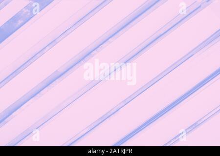 Pale pink background with diagonal blue stripes Stock Photo