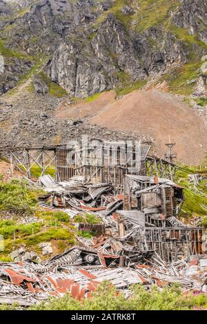 The remnants of the now abandoned Independence Mines still stand and the area is now a State Historical Park. Late summer and Fireweed (Chamaenerio... Stock Photo