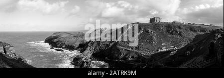 A panorama of the coast around Tintagel. Camelot Castle Hotel  in the third part of the frame. North Cornwall, UK. Stock Photo