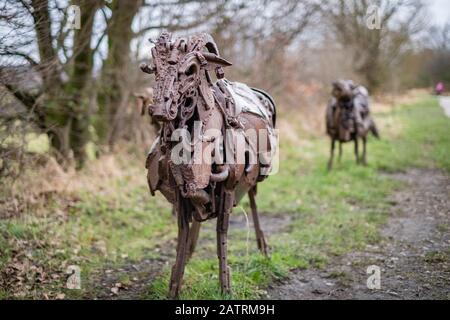 Sally Matthew’s flock of Swaledale Sheep constructed from recycled industrial scrap located on The Spen Valley Greenway Cycle Network. Stock Photo