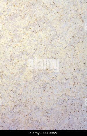 Beautiful lilac-beige background of warm stucco with a nice gradient, vertical image. Stock Photo