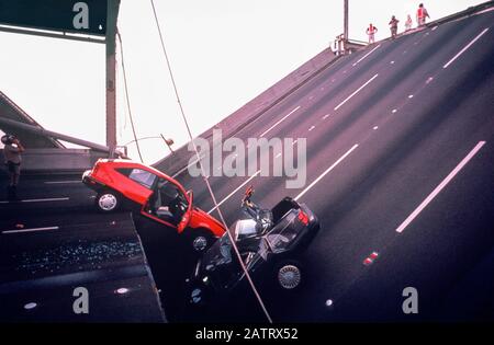 Two cars caught when the San Francisco-Oakland Bay Bridge collapsed after the 1989 Loma Prieta earthquake. Stock Photo