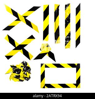 Set of different shape and size yellow black hazard caution tape strips isolated on white background. Flat lay top view. Stock Photo