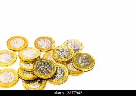 New one pound coins on a white background Stock Photo