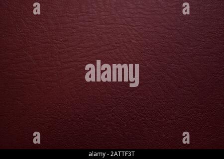 Dark red leather material texture, useful as background for design-works Stock Photo