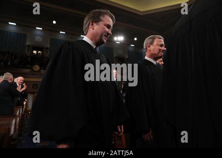 U.S. Supreme Court Associate Justice Brett Kavanaugh and Chief Justice John Roberts arrive for U.S. President Donald Trump's State of the Union address to a joint session of the U.S. Congress in the House Chamber of the U.S. Capitol in Washington, U.S. February 4, 2020. Credit: Leah Millis/Pool via CNP | usage worldwide Stock Photo