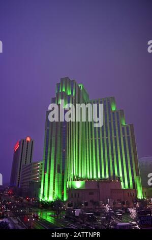 Reno, Nevada - January 17, 2020: Silver Legacy Resort Casino illuminated green at night in winter. Stock Photo