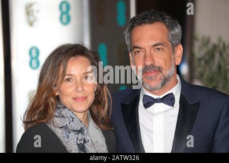 Alexandra Kravetz and Todd Philips attend the EE BAFTA after-party dinner at the Grosvenor House Hotel in London, UK Stock Photo