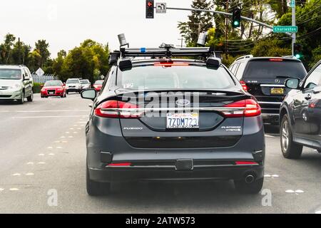 Oct 16, 2019 Palo Alto / CA / USA - Ford vehicle equipped with an autonomous driving system, performing tests on the streets of Silicon Valley Stock Photo