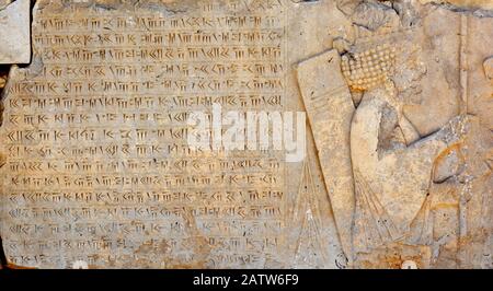 Bas relief and inscription of Artaxerxes I, at his palace, declaring faith to Ahura Mazda. Stock Photo