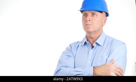 Businessman Wearing Engineer Helmet Looking Confident in a Business Presentation Stock Photo