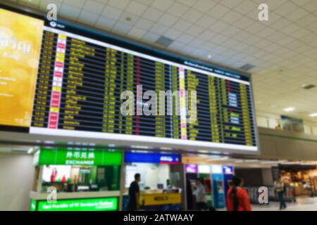 abstract blur timetable schedule digital screen board at the airport terminal for background. travel concept Stock Photo