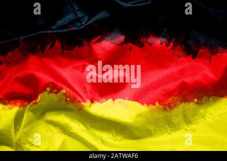 Flag of German (Federal Republic of Germany) by watercolor paint brush on canvas fabric, grunge style Stock Photo