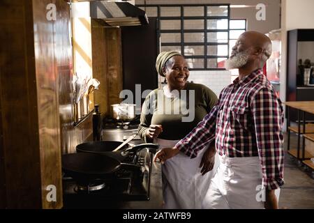 African chefs having fun while cooking Stock Photo