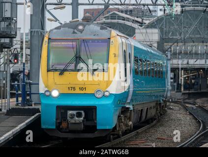 Class 175 passenger train in Arriva Trains Wales livery waiting in a station in the United Kingdom. Stock Photo