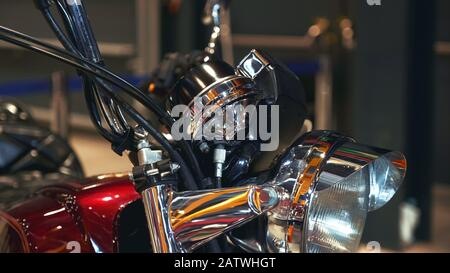 Front view of red retro motorcycle standing on the exhibition Stock Photo