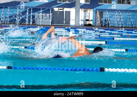 Swimmers swimming in the pool Stock Photo