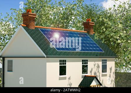 Model of a traditional old British cottage home with solar panels fitted to the roof Stock Photo
