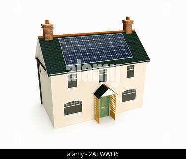 Model of a traditional old British cottage house with solar panels fitted to the roof Stock Photo