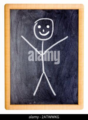Small blackboard with a childs drawing of a smiling stick man Stock Photo