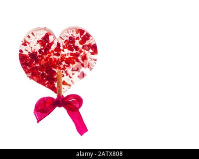 redl heart shaped lollipop isolated on a white background Stock Photo
