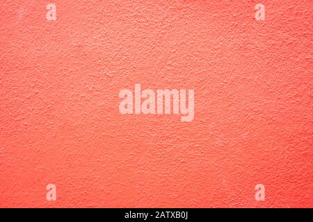 coral pink outdoor wall cement texture abstract background Stock Photo