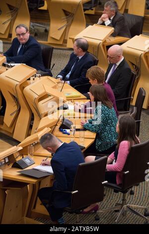 Edinburgh, UK. 5th Feb, 2020. Pictured: Nicola Sturgeon MSP - First Minister of Scotland and Leader of the Scottish National Party. Ministerial Statement: Independent Care Review. Scenes from the debating chamber in the Scottish Parliament, Holyrood in Edinburgh. Credit: Colin Fisher/Alamy Live News Stock Photo
