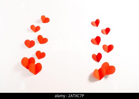 Valentine card with red heart on white background, abstract, flat lay, top view Stock Photo