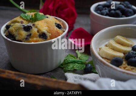 Valentines day breakfast Blueberry muffin yogurt granola served in a tray Stock Photo