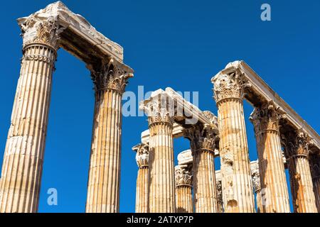 Ruins of Temple of Olympian Zeus in Athens, Greece. The ancient Greek Temple of Zeus or Olympieion is one of the main landmarks of Athens. Corinthian Stock Photo